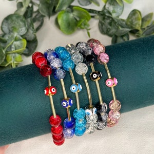 Pulsera de mal de ojo con cuentas de vidrio crujiente