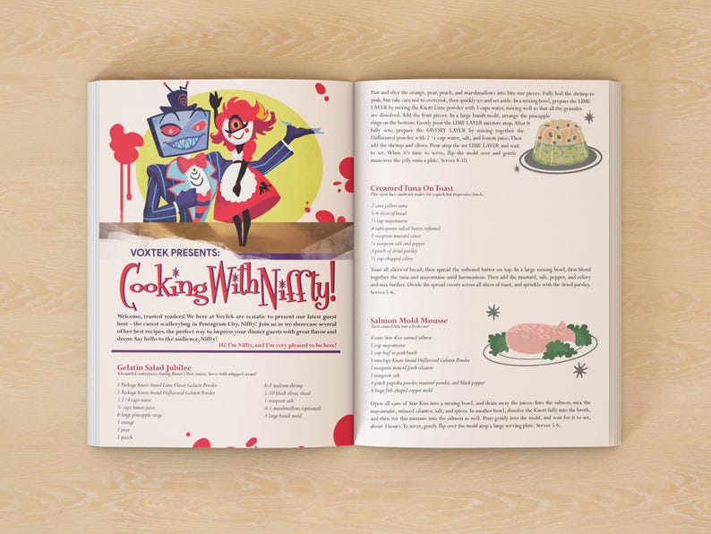 Pu&ograve; includere: Una pagina di rivista con un personaggio dei cartoni animati di nome Nilly, con il testo "VOXTEK PRESENTS: Cooking With Nilly!" e ricette per tonno cremoso su toast, mousse di salmone e gelatina di insalata.