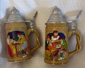 Dos jarras de cerveza estilo alemán, vintage, de la década de 1970, fabricadas en Taiwán, con tapas de peltre. ¡Como nuevas!