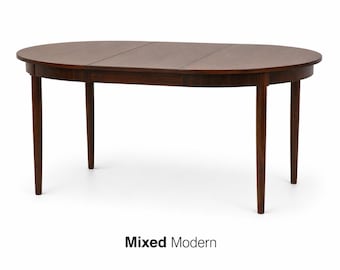 May include: A dark brown, oval-shaped dining table with four tapered legs. The tabletop has a segmented design. The words "Mixed Modern" are printed in black at the bottom of the image.
