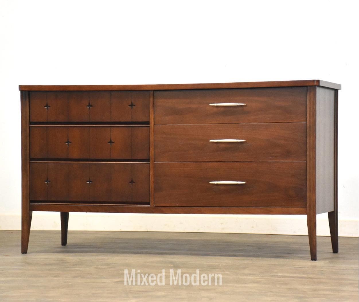 broyhill vintage mid century modern saga 5 drawer walnut dresser MCM mid century modern vintage walnut 5 drawer tall dresser by Broyhill for  their iconic Brasilia line. Circa 1960's. Beautiful walnut wood grains,  iconic 'swoops', original brass hardware. Doesn't get much more