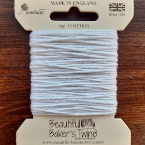 May include: White baker's twine on a card with the text "Beautiful Baker's Twine" and "Distinctly British". The card also says "Made in England" and "App. 10 Metres".