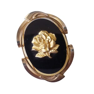 Vintage black and gold oval floral brooch pin