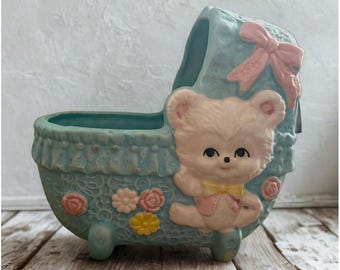 Vintage baby Stroller Planter with working Music Box.