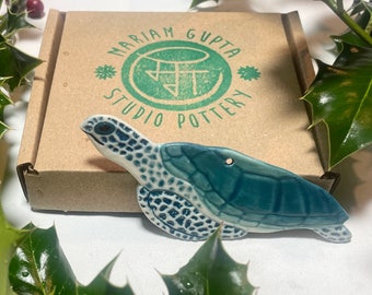 Life size, hand-crafted, newly emerged ceramic sea turtle