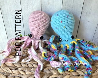 May include: Two crocheted octopus toys with black safety eyes and embroidered mouths. The left octopus is light pink with white speckles, and the right octopus is light blue with multicolored speckles. Text reads PDF PATTERN and On a Whim Crochet.