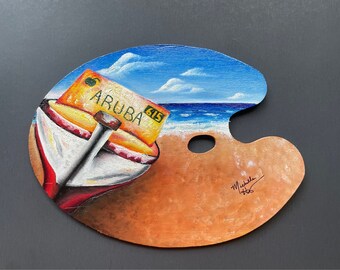 Tar stranden till dig: En kuststrandmålning på en träpalett