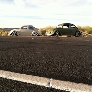 black and white Photograph of Volkswagen Beetles on backroad, VW photography, old cars, vintage cars, hot rods, classic cars, custom photos