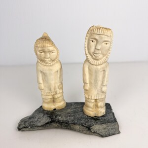 Hand carved Inuit art sculpture by Ross K
