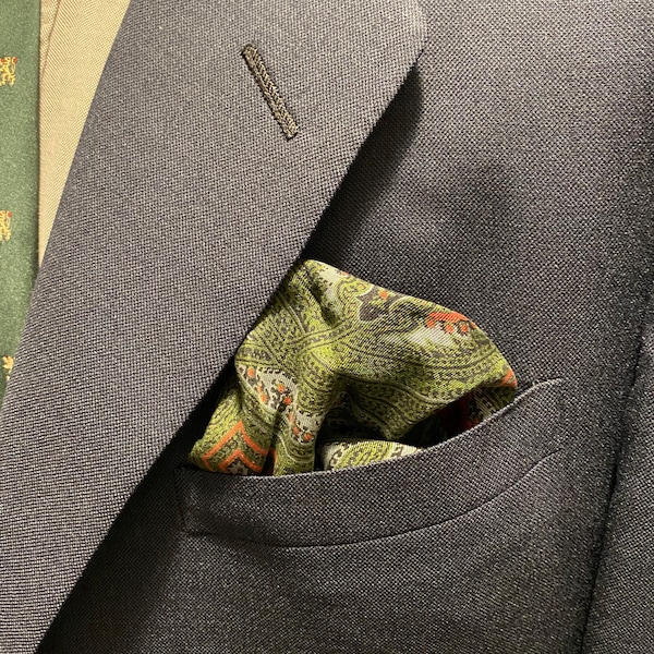 Green pocket square with paisleys