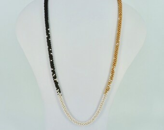 Long kumihimo necklace in gold, black en pearl white
