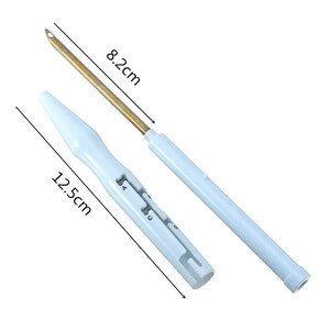 May include: A white plastic tool with a retractable needle. The needle is 8.2 cm long and the tool is 12.5 cm long.