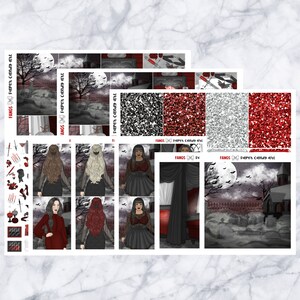 May include: A collection of planner stickers with a gothic theme. The stickers feature illustrations of a graveyard, bats, and women in dark clothing. Glitter patterns in black, silver, and red are also included. The text "FANGS Paper Candy Art" is visible.