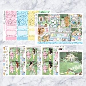 May include: A set of Easter-themed planner stickers featuring illustrations of bunnies, eggs, houses, and people. The stickers are on a white background with a glittery texture.