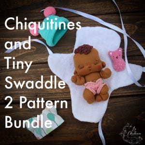 May include: A handmade doll with brown skin, wearing pink shorts, lies on a white swaddle. A teal hat with a pink pom-pom and a pink felt bear are also present. The text "Chiquitines and Tiny Swaddle 2 Pattern Bundle" is displayed.