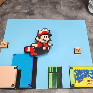 3D printed pixel art Super Mario 3 Racoon wall