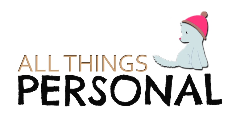 May include: A logo for a business called "All Things Personal" featuring a white cartoon animal wearing a pink hat. The text is in a gold color.