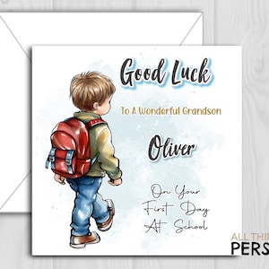 May include: A greeting card with a watercolour background featuring a cartoon boy with a red backpack. The card says "Good Luck To A Wonderful Grandson Oliver On Your First Day At School".