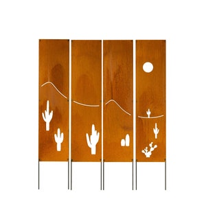 May include: Four rust-colored metal panels with cut-out designs of cacti, mountains, and a sun. The panels are attached to black metal poles.