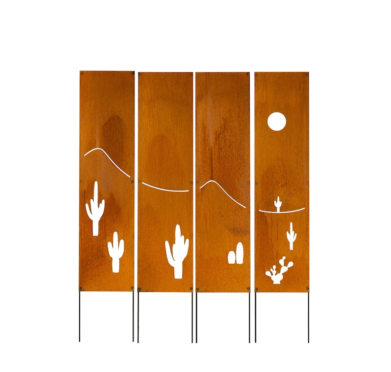 May include: Four rust-colored metal panels with cut-out designs of cacti, mountains, and a sun. The panels are attached to black metal poles.