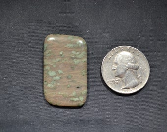 Nunderite free form Cabochon