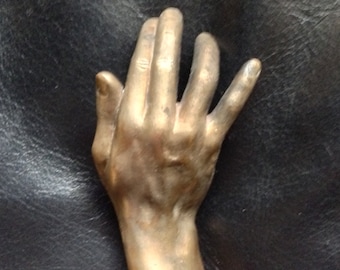 Right Arm Milagro Cast in Bronze