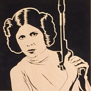 Carrie Fisher as Princess Leia Blaster at the Ready portrait is hand cut using a scroll saw and mounted to a black suede mat and framed image 3