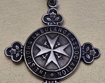 Antique sterling silver St John's fob pendant, featuring Maltese cross, lions, unicorns and foliate details. UK Birmingham 1917 hallmark.