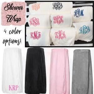May include: White, black, pink, and gray shower wraps with embroidered initials. The image shows several wraps with different monogrammed initials in various colors. The text in the image says "Shower Wrap" and "4 color options!"