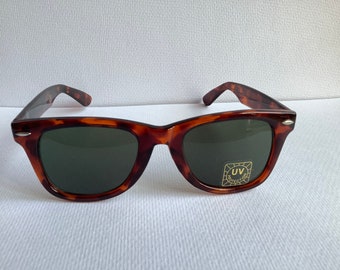 Vintage Sunglasses. New old Stock. Laser brand. UV protection.