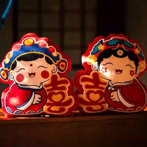Chinese Wedding - Set of 2 - Merry Couple Cushions - Bride and Groom in Traditional Chinese Wedding Costume holding Double Happiness