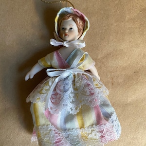 Vintage Porcelain Hanging Doll with Lace Trimmed Dress