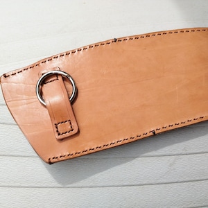 Leather sheath for saw or machete
