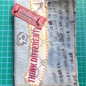 Handmade notebook covered with recycled jeans