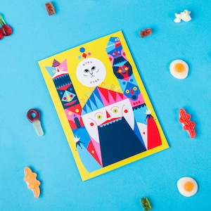 May include: A yellow magazine featuring a colourful illustration of a cartoon character wearing a crown with a blue face. The magazine is titled "MYAU ZINE" and "QUAN PARK" with the number "#5" and the date "February 2017".