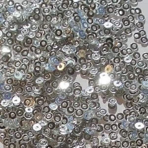 Tiny 2mm Metallic Silver Sequins x 5g. Thousands of metallic silver effect 2mm sequins. Tiny sequins, embroidery, embellishment, dolls house