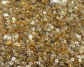 Large Pack Tiny 2mm Metallic Gold Sequins x 20g. Thousands of metallic gold effect 2mm sequins. Embroidery, embellishment, dolls house.