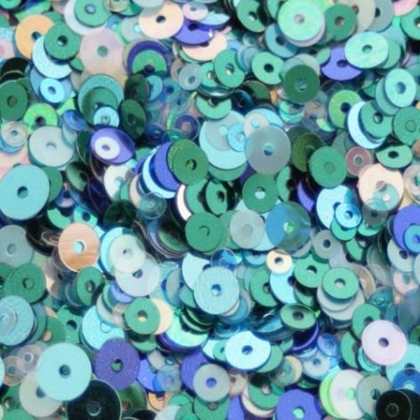 Mixed Seascape Sequins x 20g. Mixed blue, white, silver, turquoise sew on sequins.  Mixed colours and sizes.  Embroidery Embellishments.