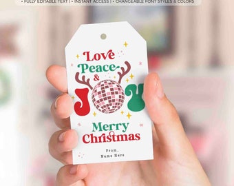 May include: A white gift tag with a red, green, and gold design featuring the words "Love Peace & Joy" with a disco ball graphic. The text "Merry Christmas" is below the graphic. The tag also includes the text "From: Name Here".