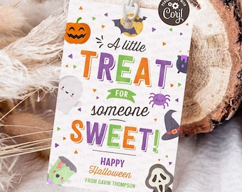 May include: A white tag with a colorful Halloween theme. It says "A little treat for someone sweet!" with a pumpkin, ghost, spider, witch hat, and other Halloween icons. It also says "Happy Halloween from Gavin Thompson" and "www.CutePartyDash.com".