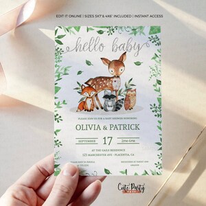 May include: A baby shower invitation with a woodland theme. The invitation features a watercolor illustration of a deer, fox, raccoon, and owl surrounded by green leaves. The text on the invitation reads "hello baby", "Olivia & Patrick", "September 17", "2PM-4PM", "At The Gail's Residence", "123 Manchester Ave - Placentia, CA".