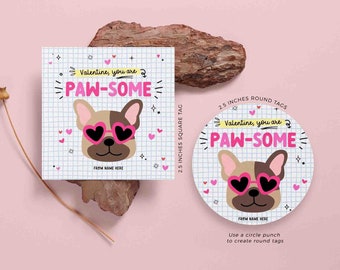 May include: Two printable Valentine's Day tags featuring a cartoon dog wearing heart-shaped sunglasses. The text on the tags reads "Valentine, you are paw-some". The tags are available in 2.5 inch square and round sizes.
