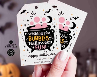 May include: Pink and black Halloween gift tags with a cauldron filled with pink bubbles and the text "Wishing you bubbles of Halloween fun!" and "Happy Halloween xoxo | Charlotte".