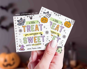 May include: Two Halloween-themed gift tags held by a hand. The tags feature the text "a little TREAT for someone so SWEET" with illustrations of a bat, pumpkin, spiderweb, and witch hat. The tags are on lined paper.