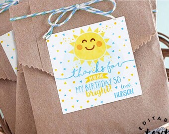 May include: A yellow sun with a smiling face on a blue background with yellow and blue confetti. The text "thanks for making my birthday so bright! love, HUDSON" is on the tag. This is an editable printable thank you tag for a birthday party.