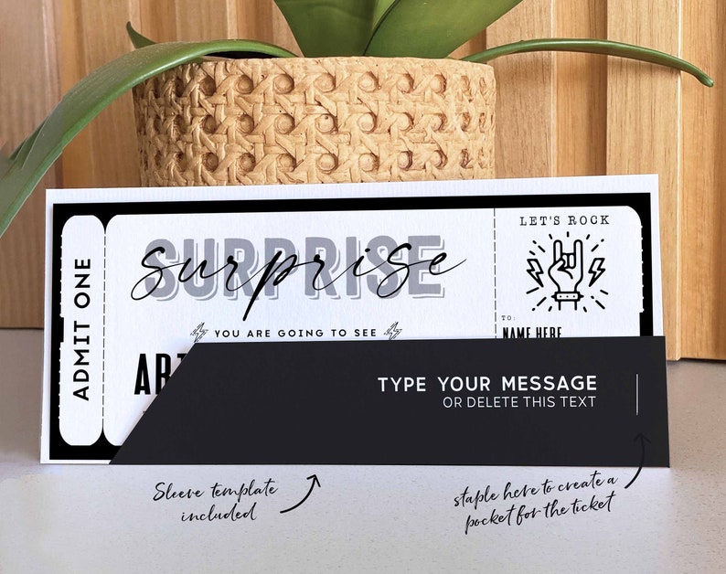 May include: A black and white printable ticket template with the text "Surprise! You are going to see..." and "Let's Rock!" with a rock and roll hand symbol. The ticket has a black sleeve with the text "Type your message or delete this text".
