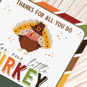 May include: A Thanksgiving-themed card with a cartoon turkey wearing a pilgrim hat. The card says "Thanks for all you do for our little turkey".