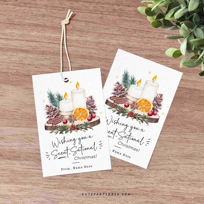 May include: Two gift tags with a watercolor illustration of candles, oranges, cinnamon sticks, and pine cones. The text on the tags reads "Wishing you a Scent-Sational Christmas!" and includes space for a name.