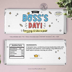 May include: A printable chocolate bar wrapper design for Boss's Day. The wrapper is white with a blue and pink title that says "Happy Boss's Day! Bossing it like a pro!" and a crown graphic. The wrapper also includes a nutrition facts label and ingredients list.