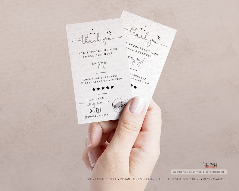 May include: Two white thank you cards with black text. The text says "Thank you for supporting our small business. Enjoy!" and "Love your purchase? Please leave us a review." with five stars below. The cards also have social media icons for Instagram and Facebook. The text "Please tag us" is above the icons.